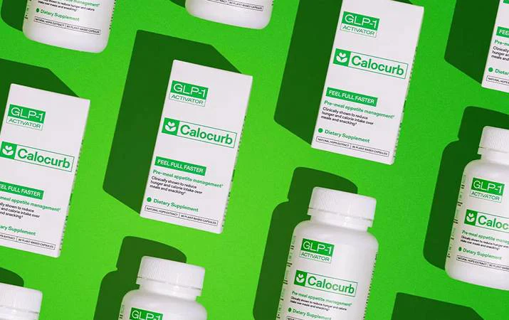 Multiple Calocurb supplement bottles and boxes displayed on a green background
