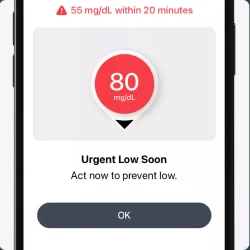 Smartphone screen displaying a Dexcom G7 urgent low soon alert with predicted glucose drop and instructions to act